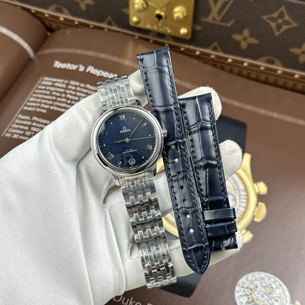 Dong-Ho-Omega-De-Ville-Prestige-Rep-Cao-Cap-Mat-So-Mau-Xanh-Duong-May-Co-Thuy-Sy-34mm-1.jpg.webp